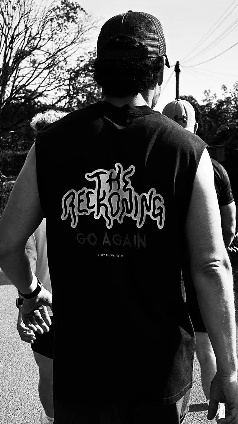 A runner in The Reckoning vest at the Backyard Ultra